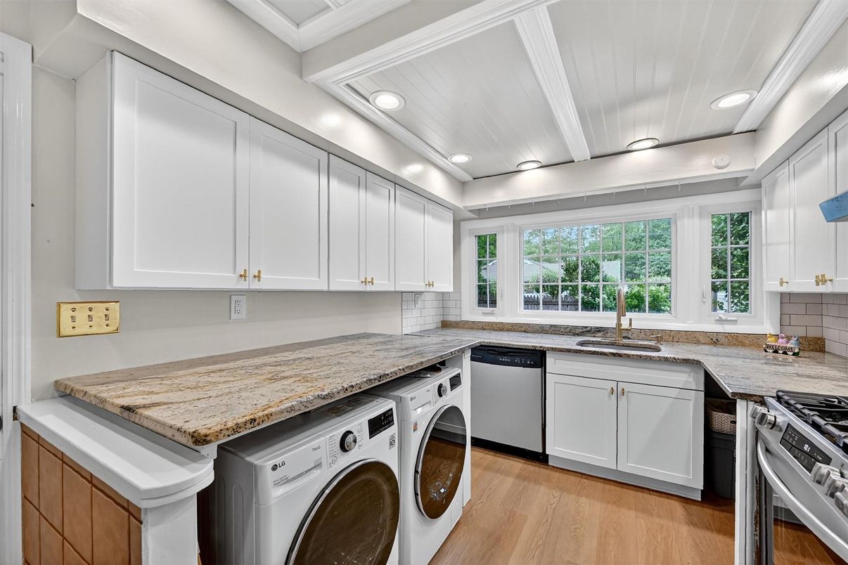 Interior, Kitchen, Recessed Lighting, Washer, Wood Texture Flooring