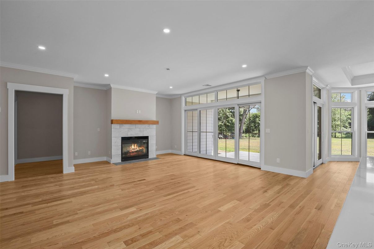 Empty room, Fireplace, Interior, Recessed Lighting, Wood Texture Flooring