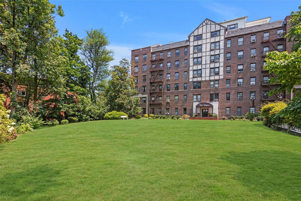 Backyard, Exterior, Facade, Brick Facade, Condo Building
