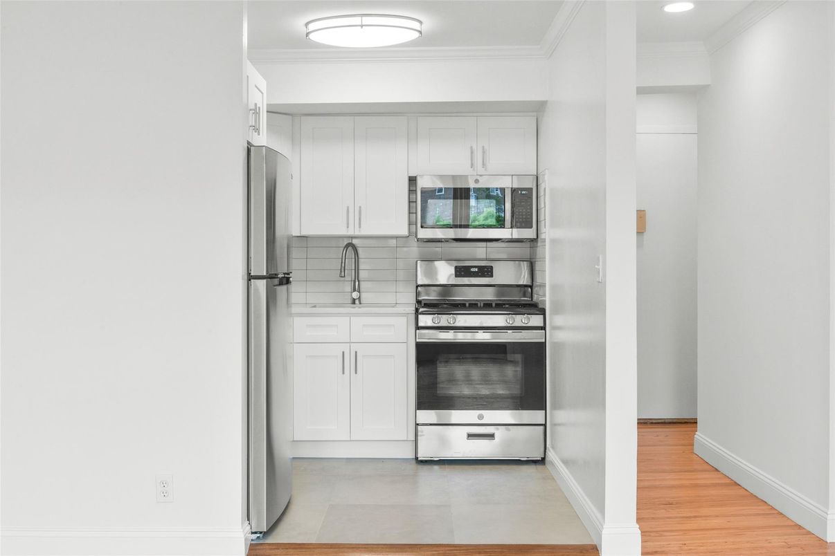 Interior, Kitchen, Recessed Lighting, Stainless Steel Appliances, Wood Texture Flooring