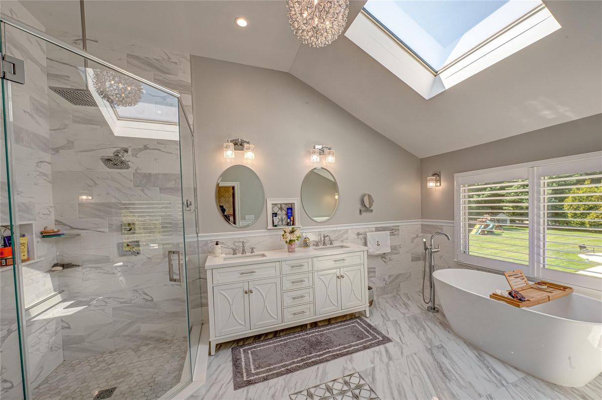 Bathroom, Dual Sink Vanities, Free Standing Baths, Glass Shower, Interior, Marble, Marble Walls, Recessed Lighting