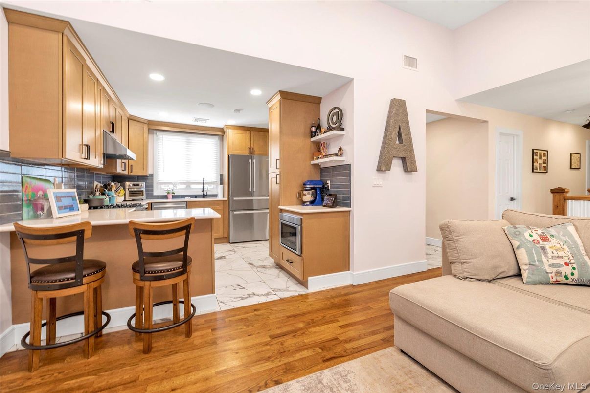 Interior, Kitchen, Marble, Recessed Lighting, Stainless Steel Appliances, Wood Texture Flooring