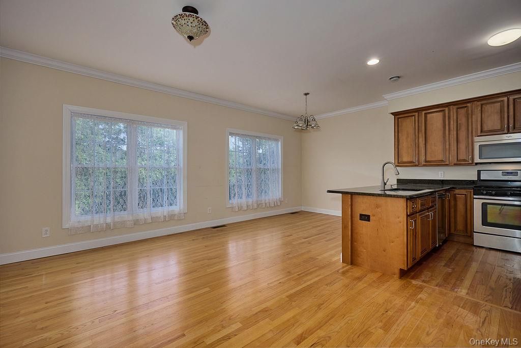 Chandelier, Interior, Kitchen, Recessed Lighting, Stainless Steel Appliances, Wood Texture Flooring
