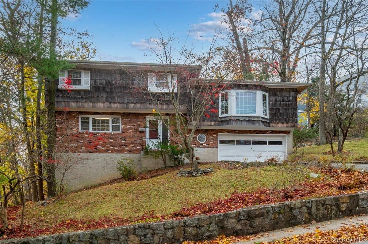 Attached, Exterior, Facade, Brick Facade, Raised Ranch