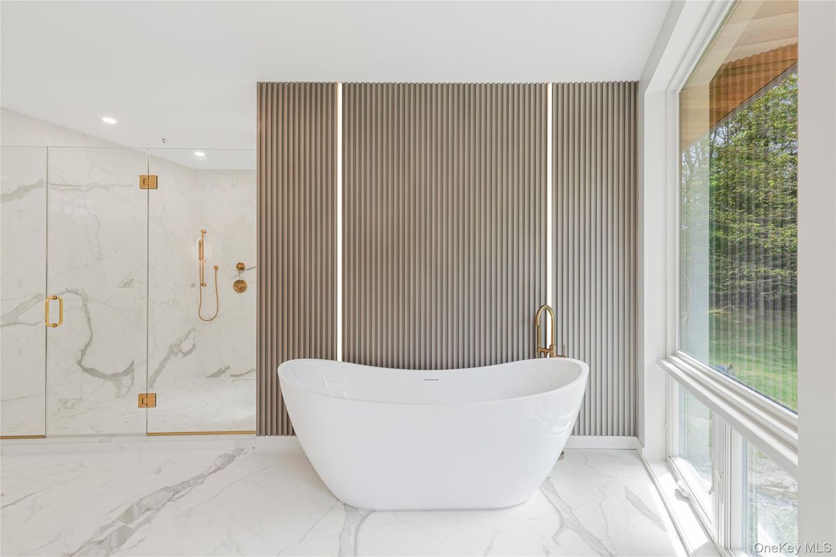Bathroom, Free Standing Baths, Glass Shower, Interior, Marble, Marble Walls, Recessed Lighting