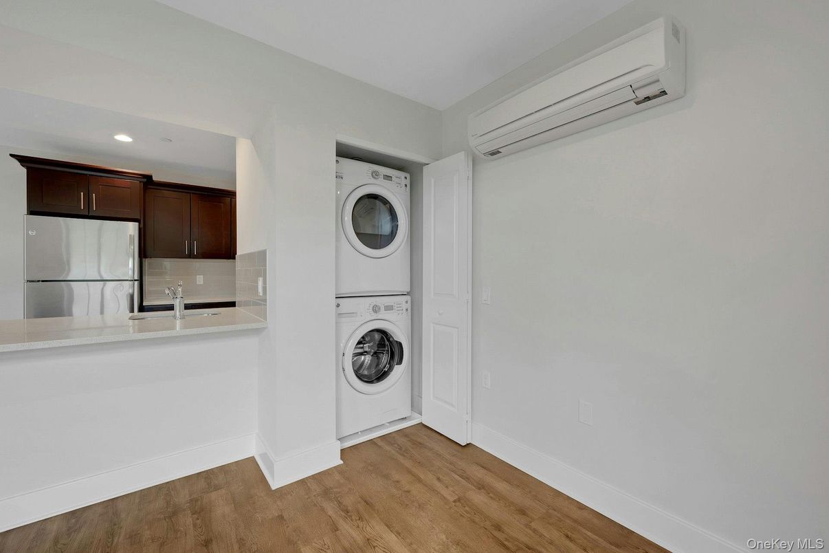 Interior, Kitchen, Recessed Lighting, Utility Closets, Washer, Wood Texture Flooring