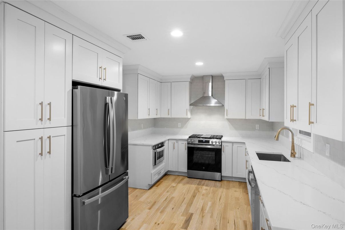 Interior, Kitchen, Recessed Lighting, Stainless Steel Appliances, Wood Texture Flooring