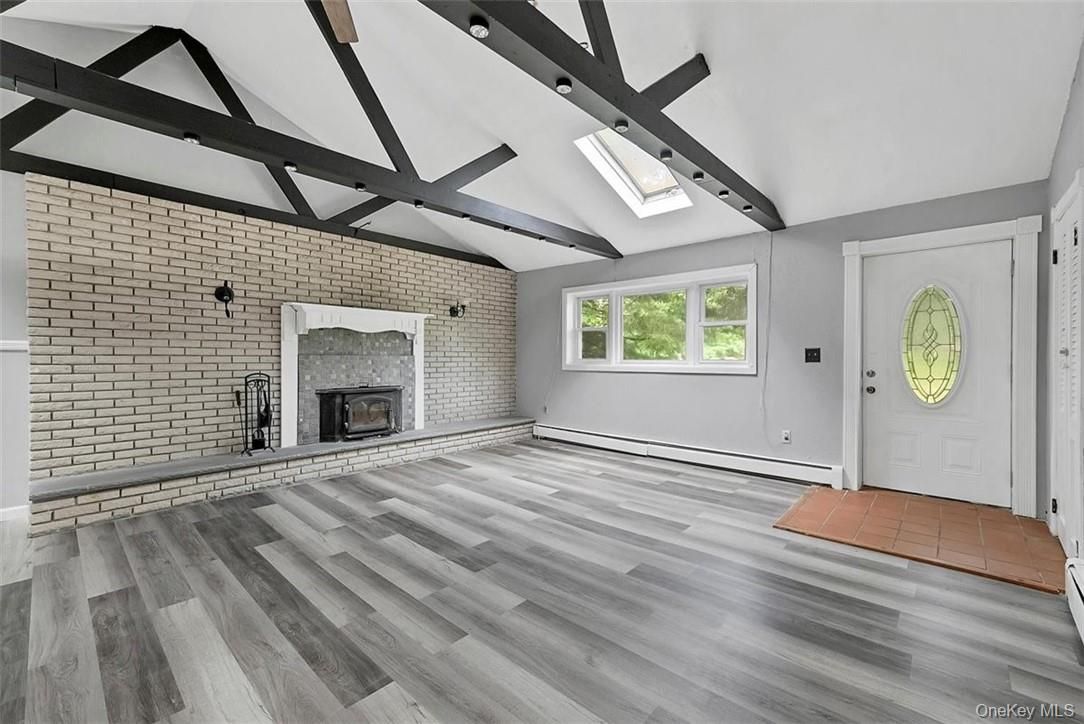 Empty room, Fireplace, Interior, Stone Walls, Wood Texture Flooring