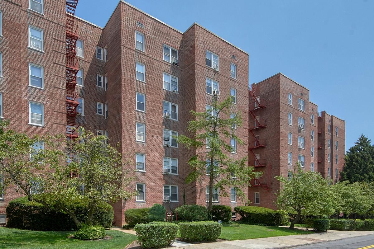 Exterior, Facade, Brick Facade, Condo Building
