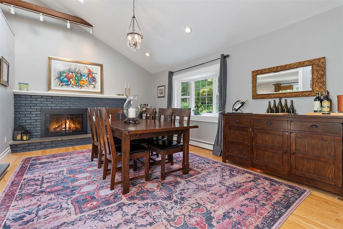 Dining room, Fireplace, Interior, Pendant Lights, Recessed Lighting, Wood Texture Flooring