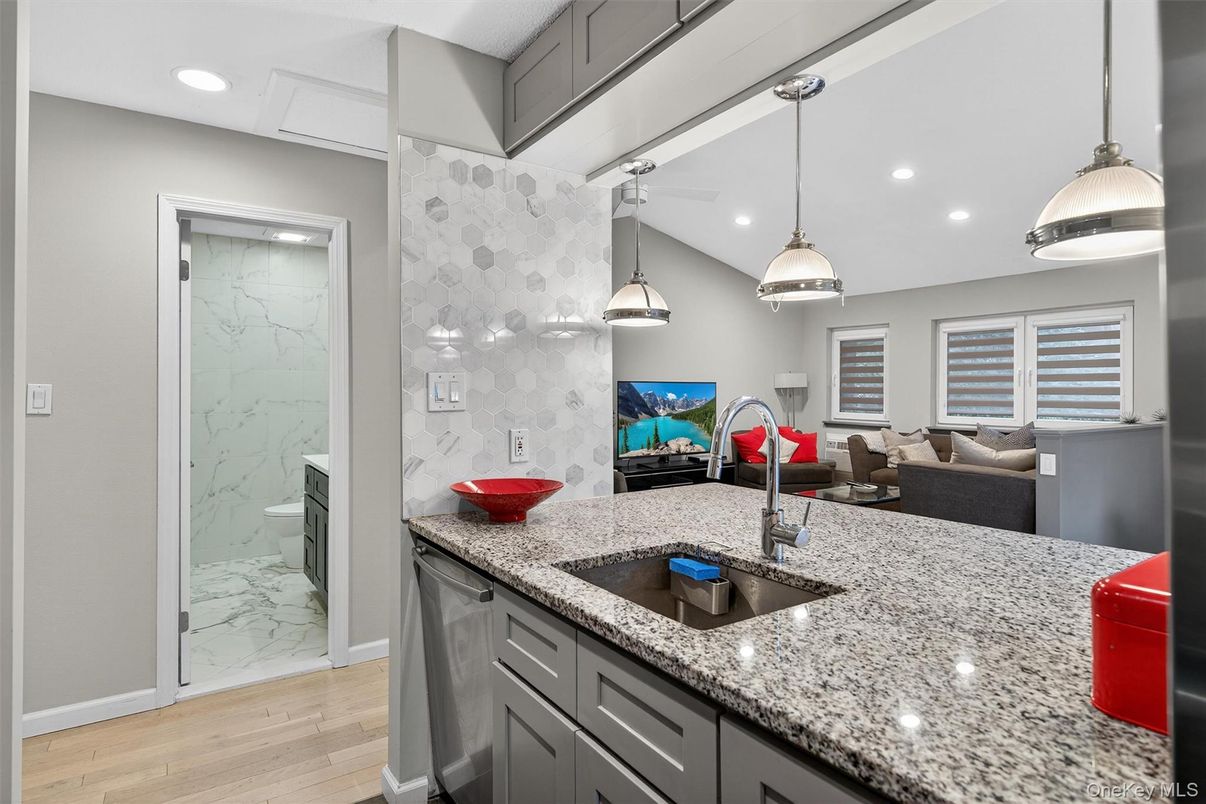 Interior, Marble Walls, Pendant Lights, Recessed Lighting, Wood Texture Flooring