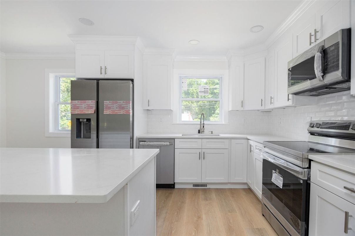 Interior, Kitchen, Recessed Lighting, Stainless Steel Appliances, Wood Texture Flooring