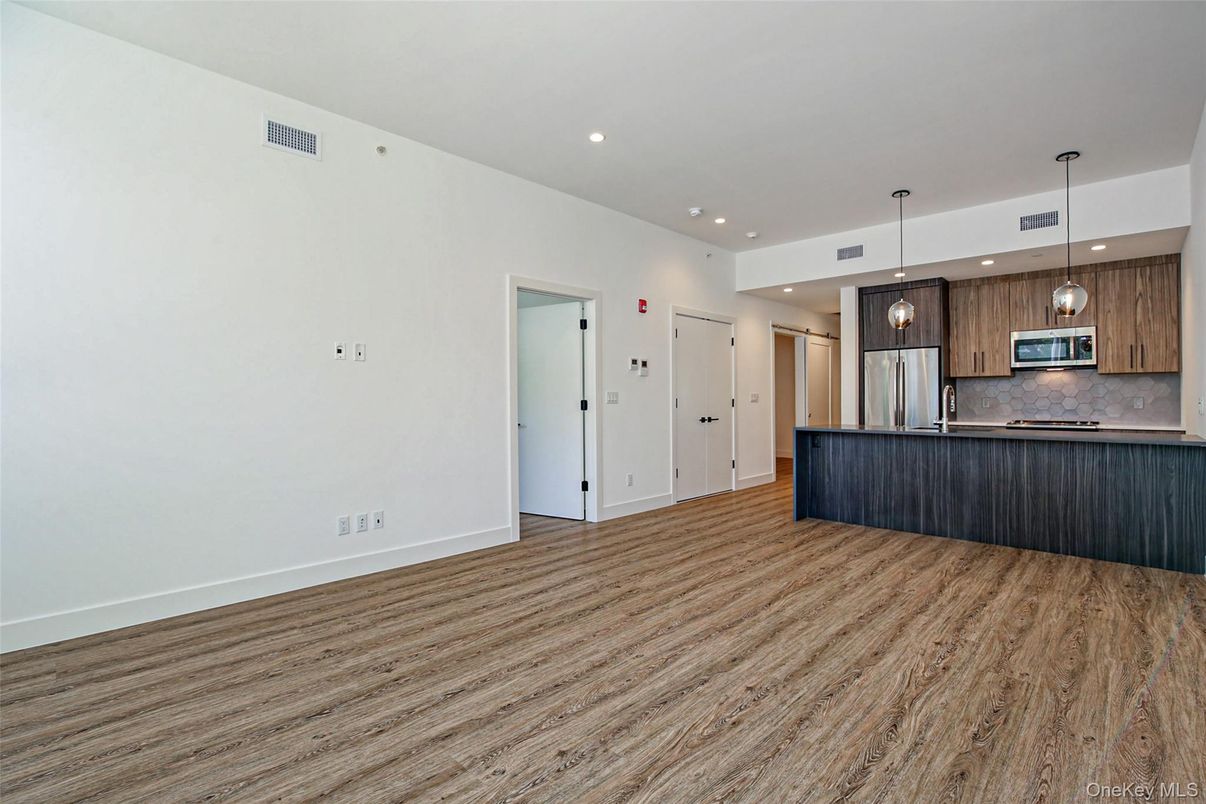 Interior, Kitchen, Pendant Lights, Recessed Lighting, Stainless Steel Appliances, Wood Texture Flooring