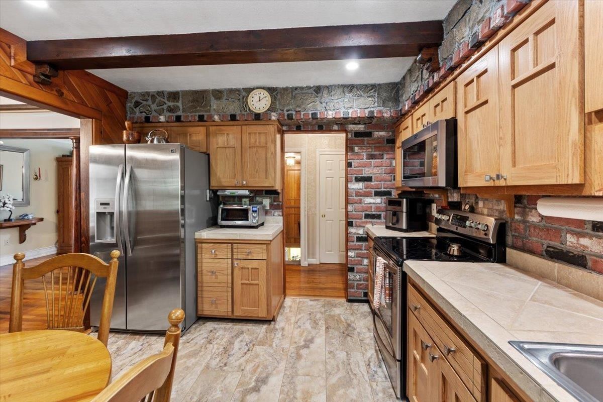 Interior, Kitchen, Recessed Lighting, Stainless Steel Appliances, Stone Walls, Tile Countertops, Wooden Beams, Wood Texture Flooring