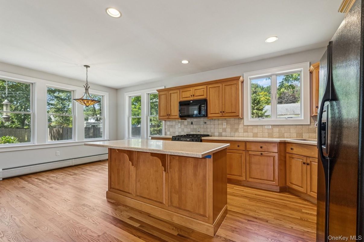 Interior, Kitchen, Pendant Lights, Recessed Lighting, Tile Countertops, Wood Texture Flooring