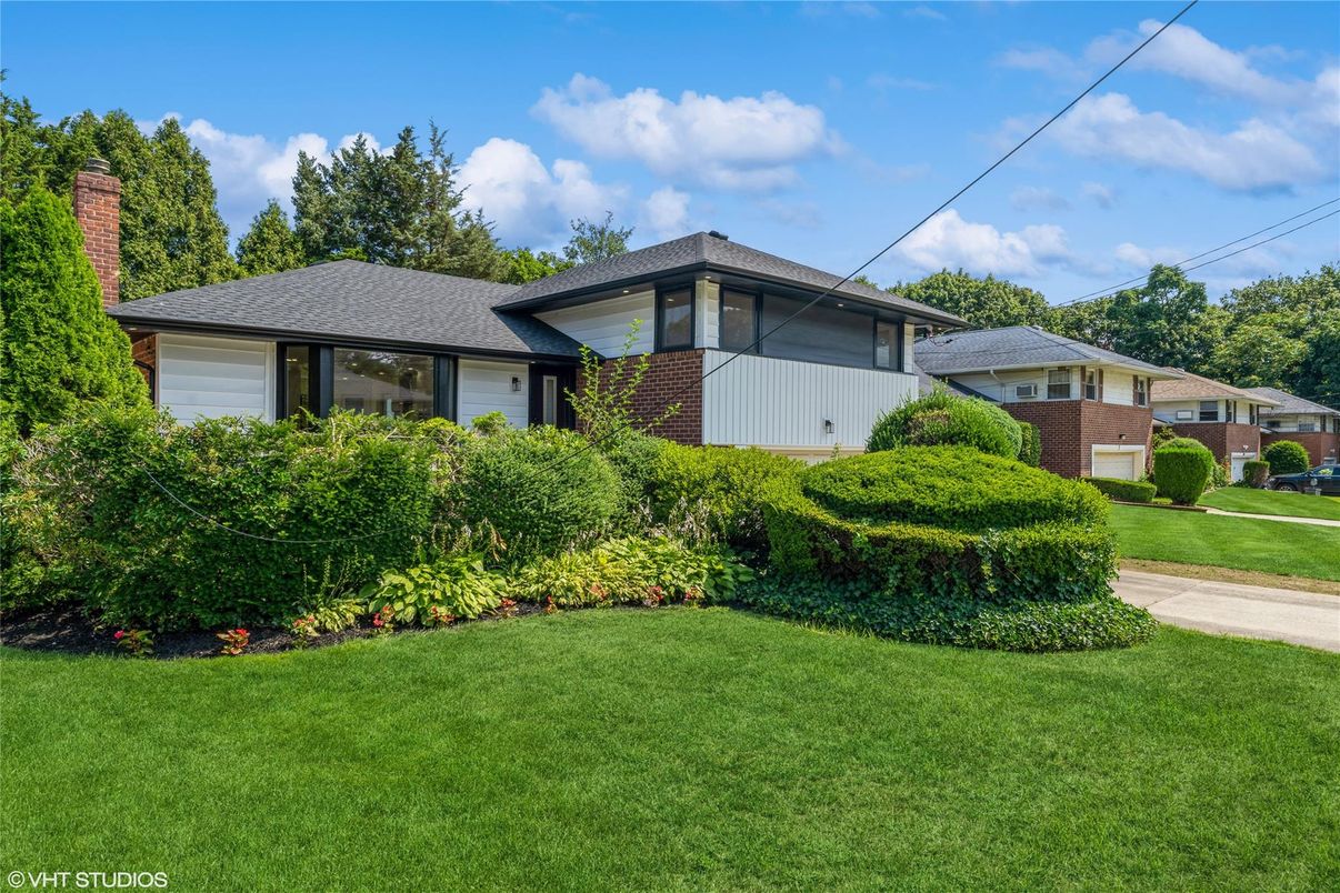Attached, Backyard, Exterior, Facade, Brick Facade, Split Level