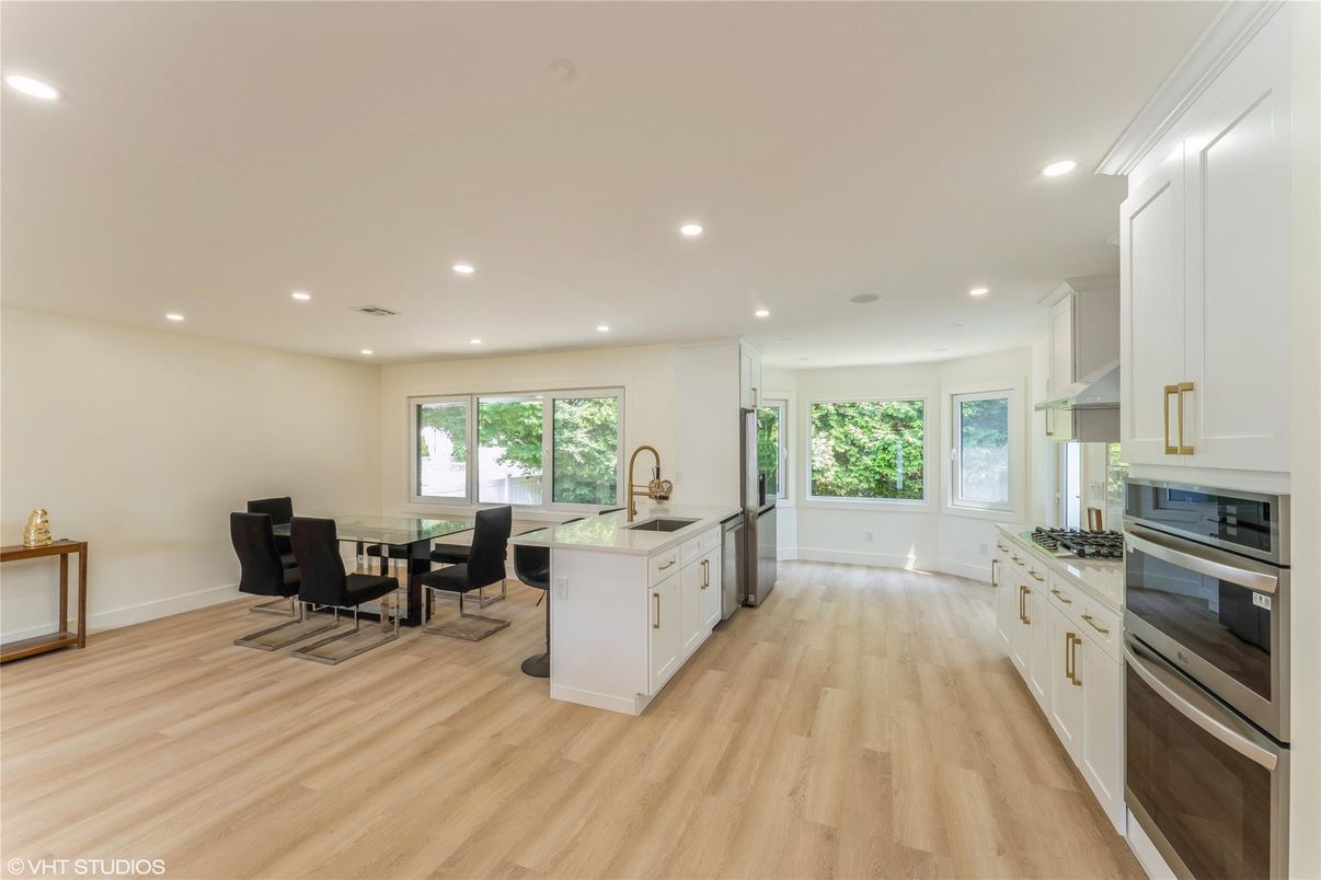 Dining room, Interior, Kitchen, Recessed Lighting, Stainless Steel Appliances, Wood Texture Flooring