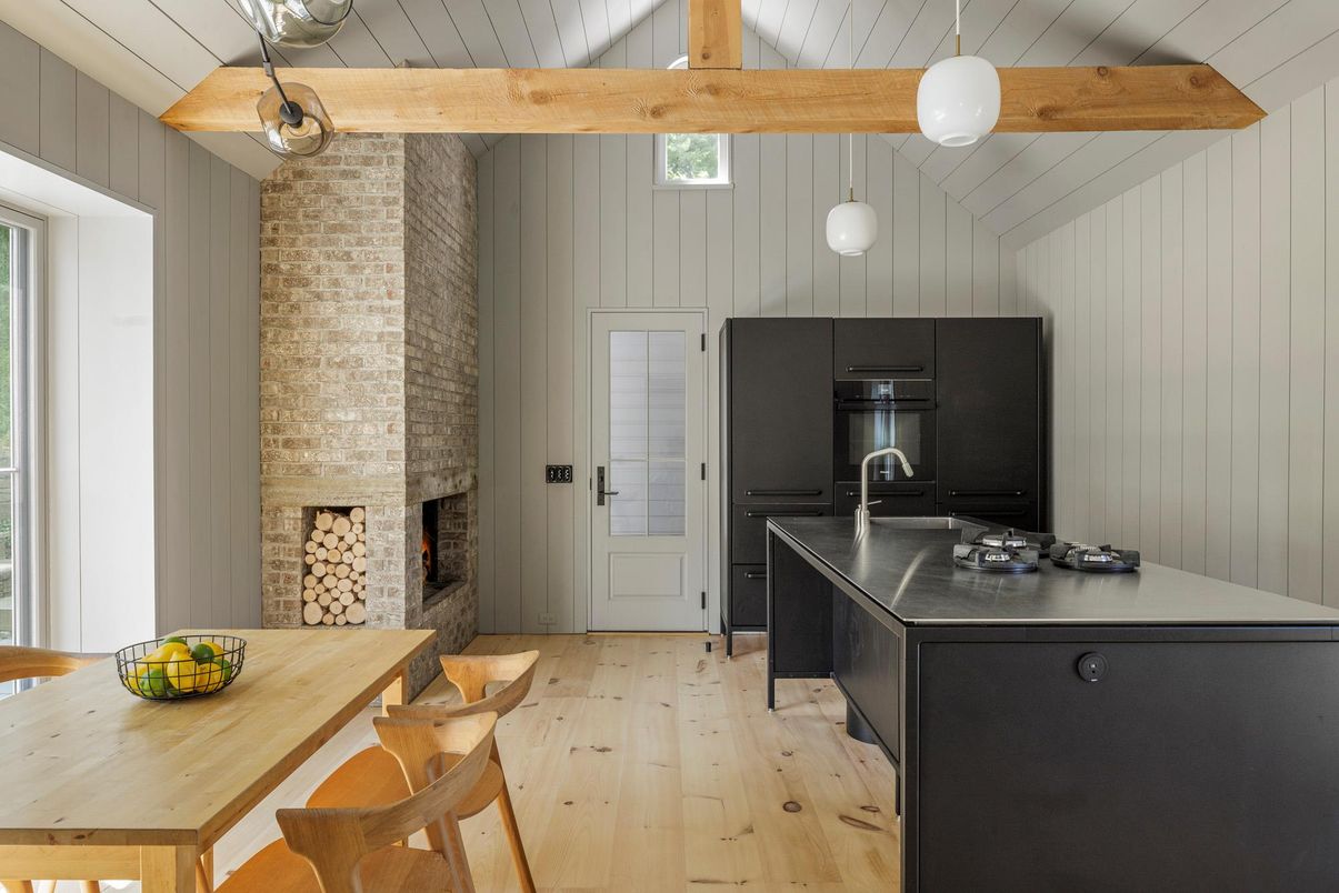 Fireplace, Interior, Kitchen, Pendant Lights, Stainless Steel Appliances, Stone Walls, Wooden Beams, Wood Texture Flooring