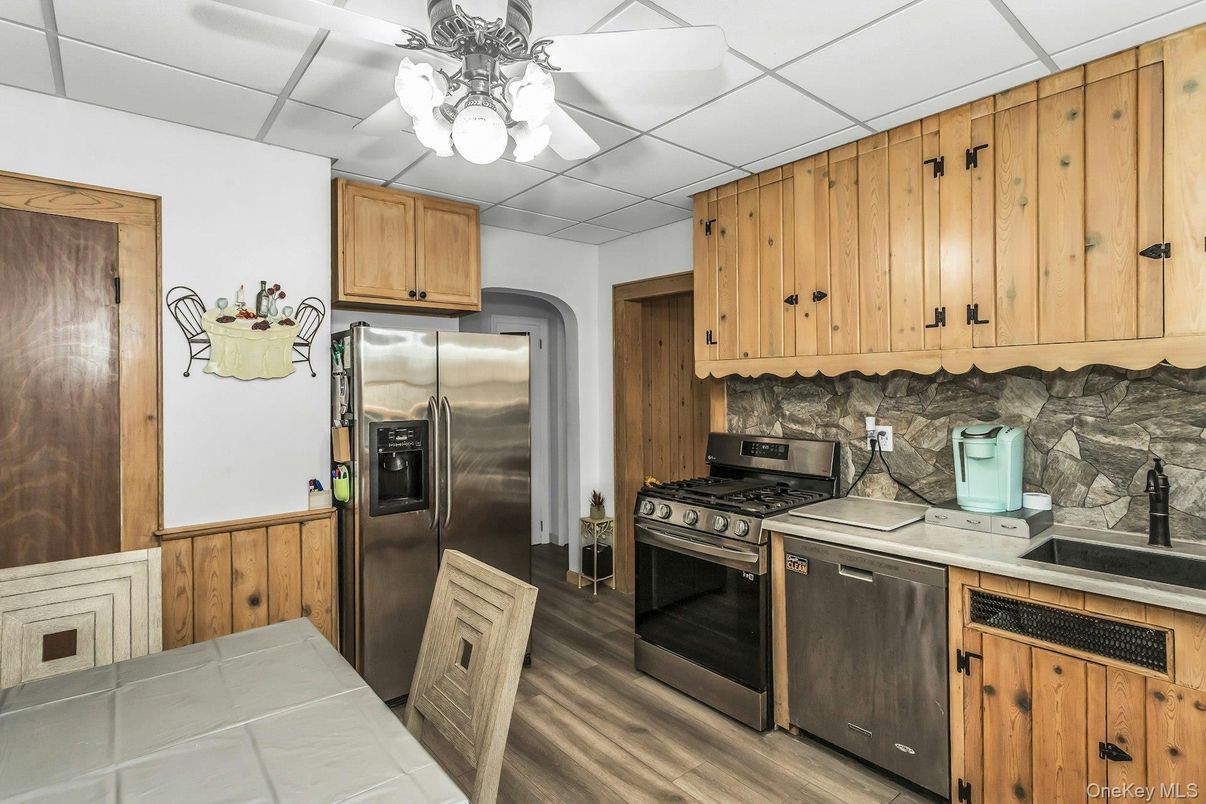 Interior, Kitchen, Stainless Steel Appliances, Tile Countertops, Wood Texture Flooring