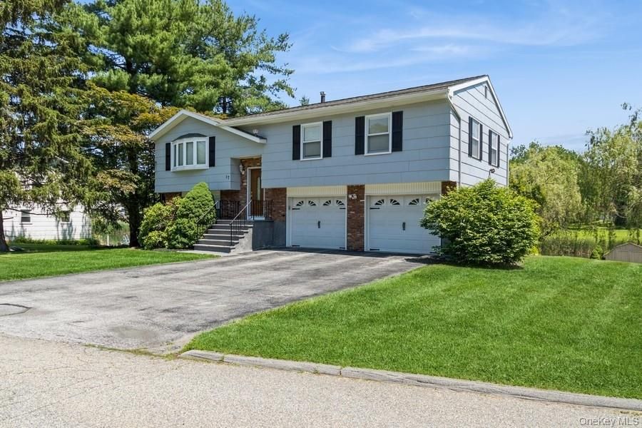 Attached, Exterior, Facade, Raised Ranch