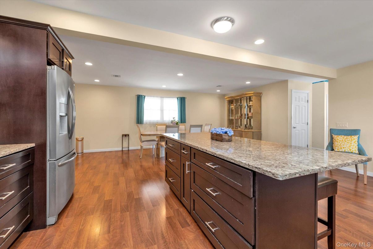 Dining room, Interior, Kitchen, Recessed Lighting, Stainless Steel Appliances, Wood Texture Flooring