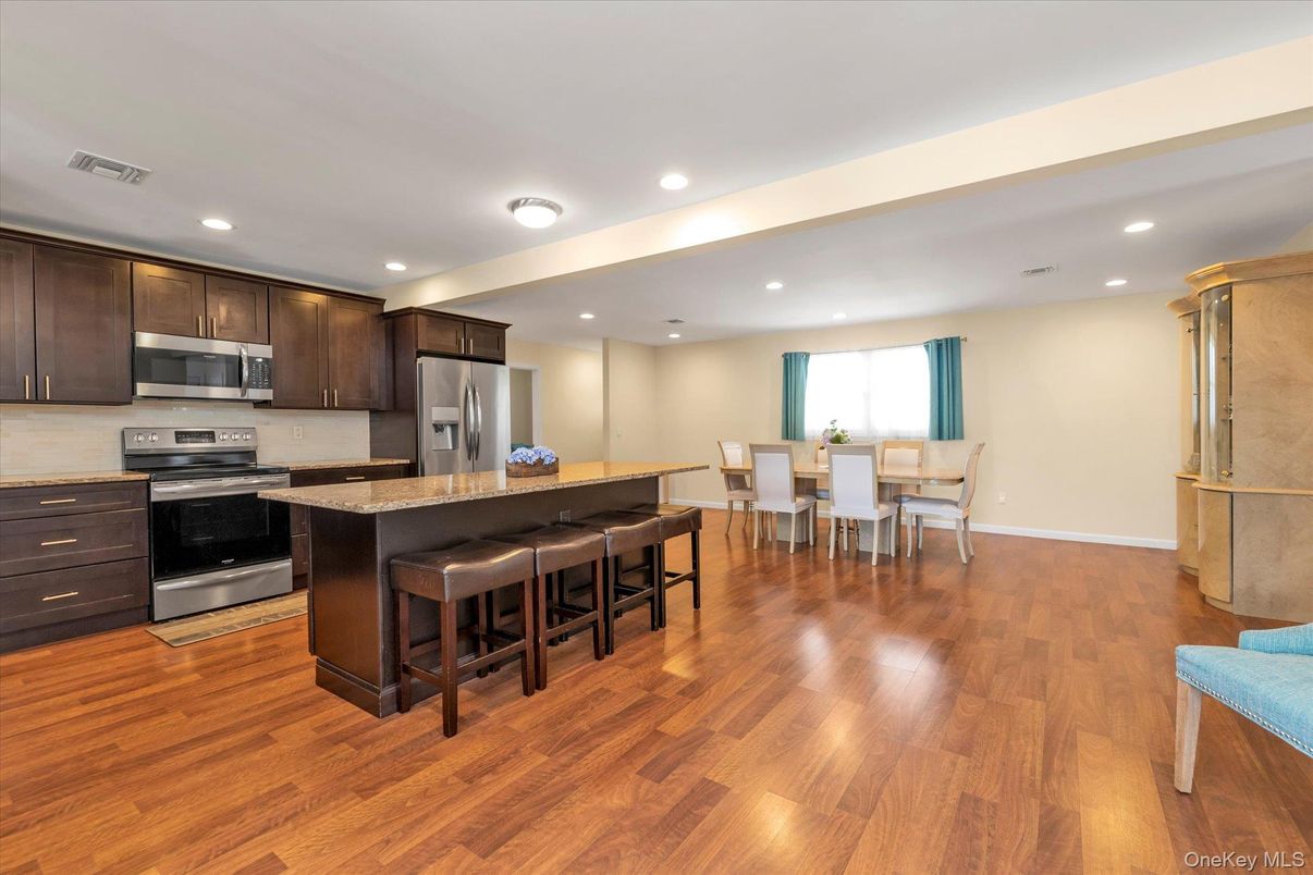 Dining room, Interior, Kitchen, Recessed Lighting, Stainless Steel Appliances, Wood Texture Flooring