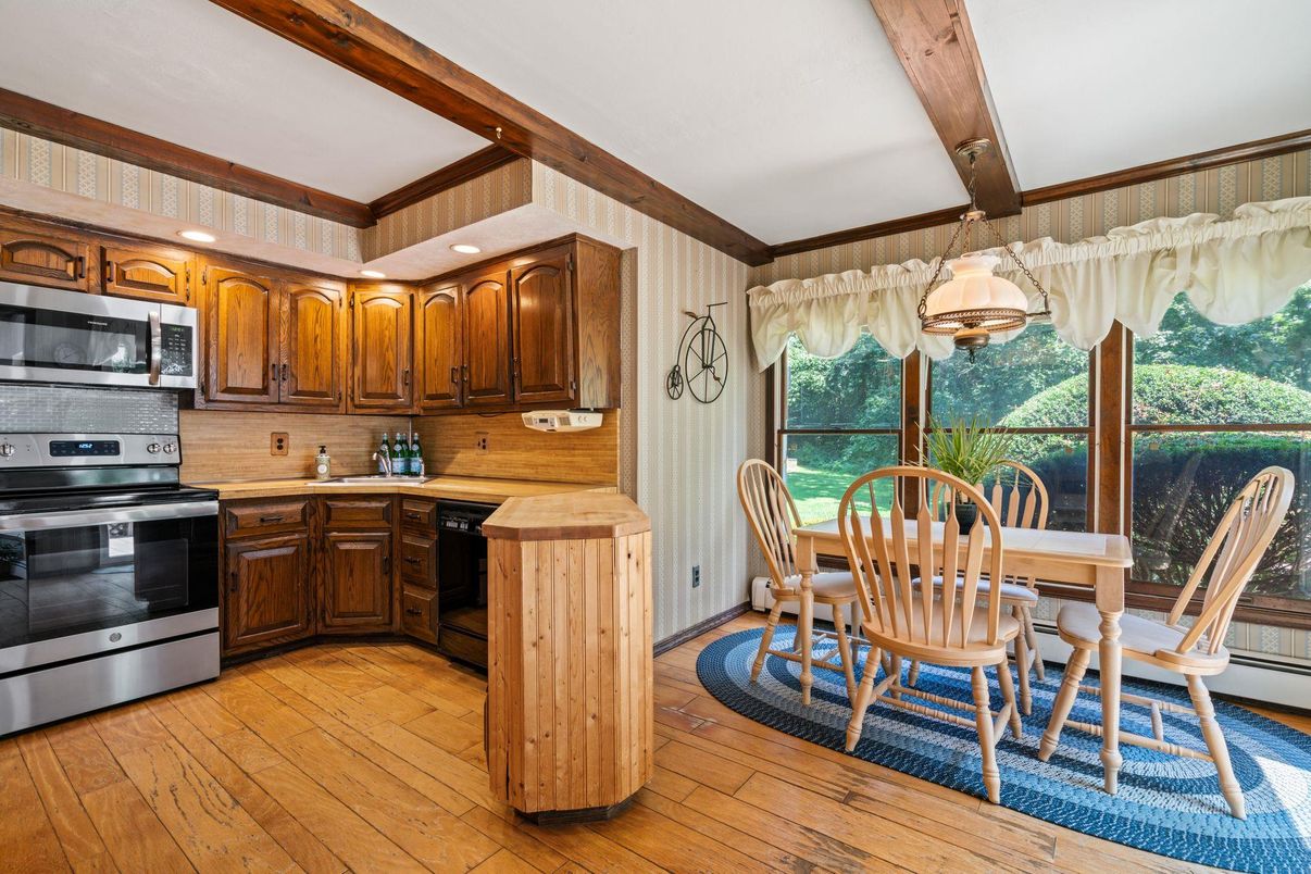Dining room, Interior, Kitchen, Recessed Lighting, Stainless Steel Appliances, Wooden Beams, Wood Texture Flooring