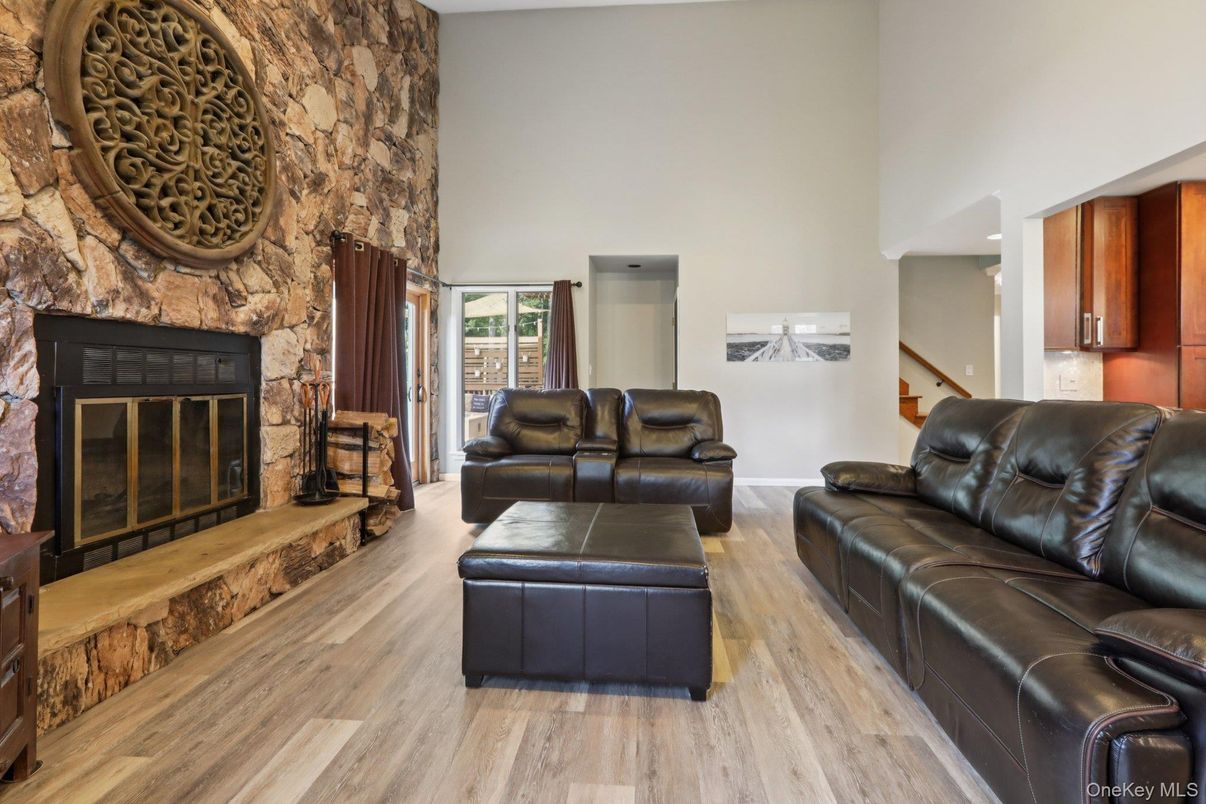 Fireplace, Interior, Living room, Recessed Lighting, Wood Texture Flooring