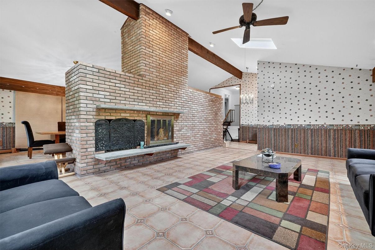 Fireplace, Interior, Living room, Pendant Lights, Recessed Lighting, Stone Walls, Wooden Beams