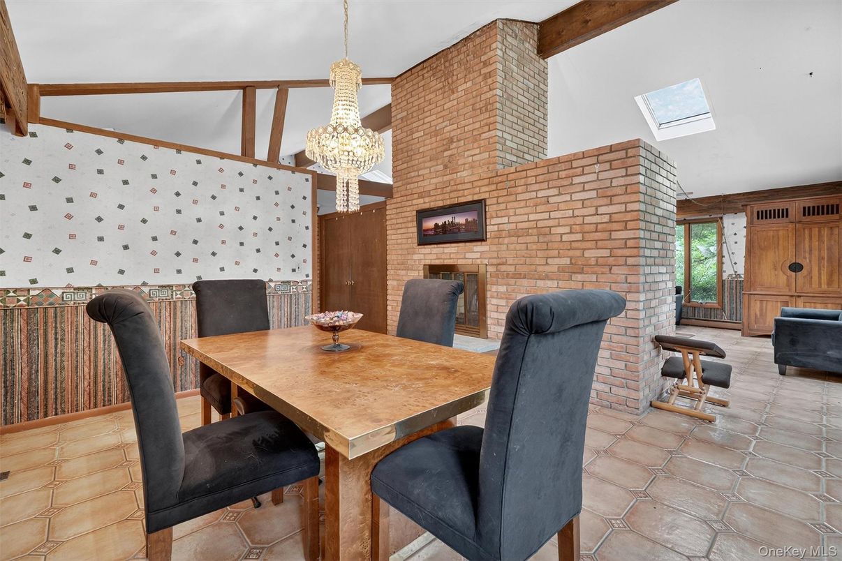 Chandelier, Dining room, Fireplace, Interior, Pendant Lights, Stone Walls, Wooden Beams
