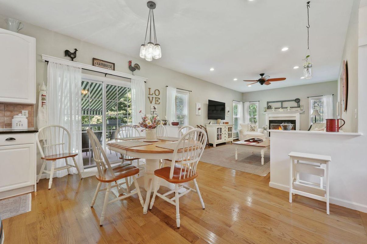 Dining room, Fireplace, Interior, Living room, Pendant Lights, Recessed Lighting, Wood Texture Flooring