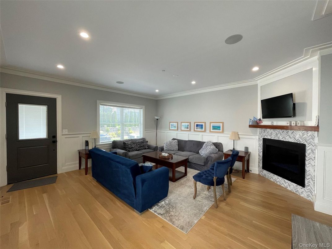 Fireplace, Interior, Living room, Recessed Lighting, Wood Texture Flooring