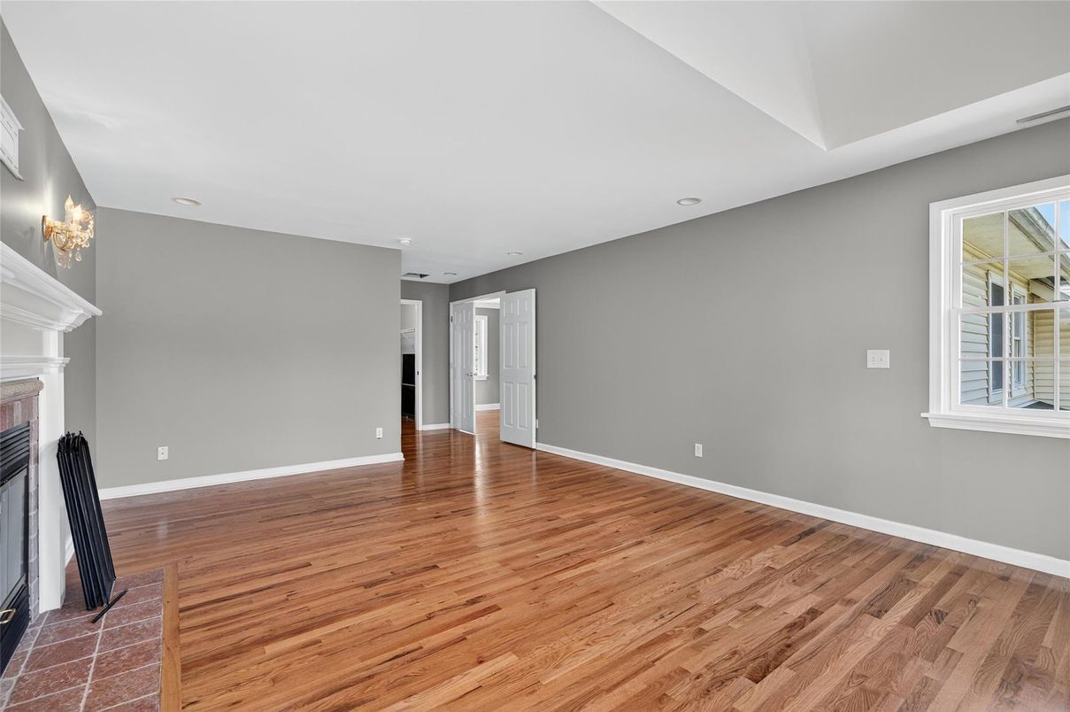 Empty room, Fireplace, Interior, Recessed Lighting, Wood Texture Flooring