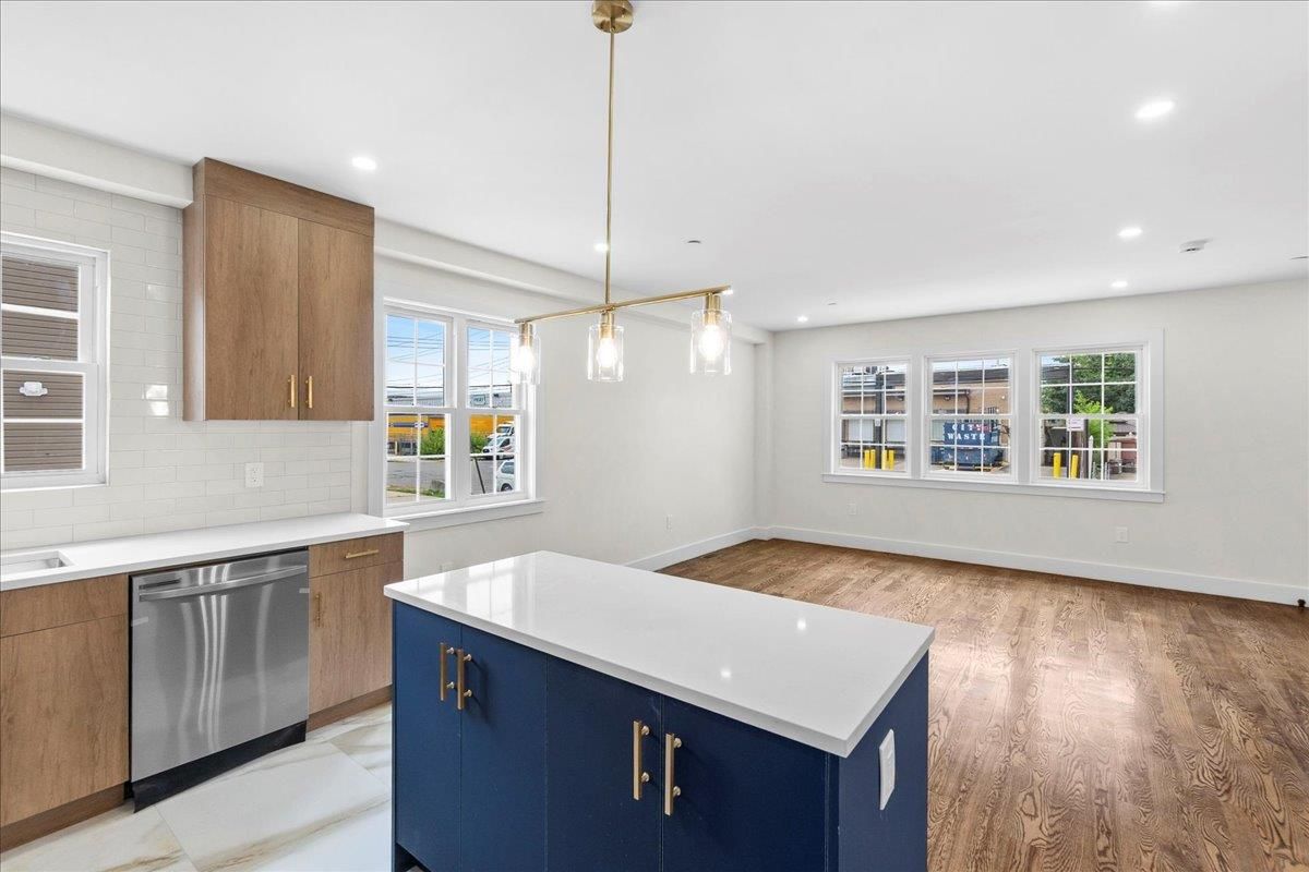 Interior, Kitchen, Pendant Lights, Recessed Lighting, Stainless Steel Appliances, Wood Texture Flooring