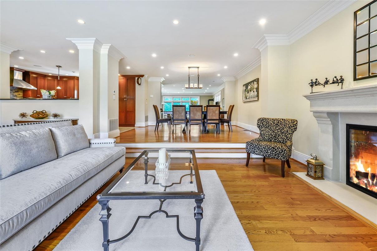 Dining room, Fireplace, Interior, Living room, Pendant Lights, Recessed Lighting, Wood Texture Flooring