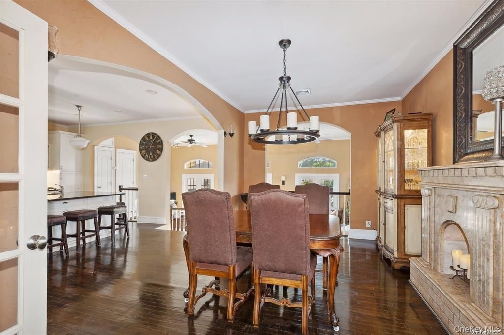 Dining room, Fireplace, Interior, Pendant Lights, Wood Texture Flooring