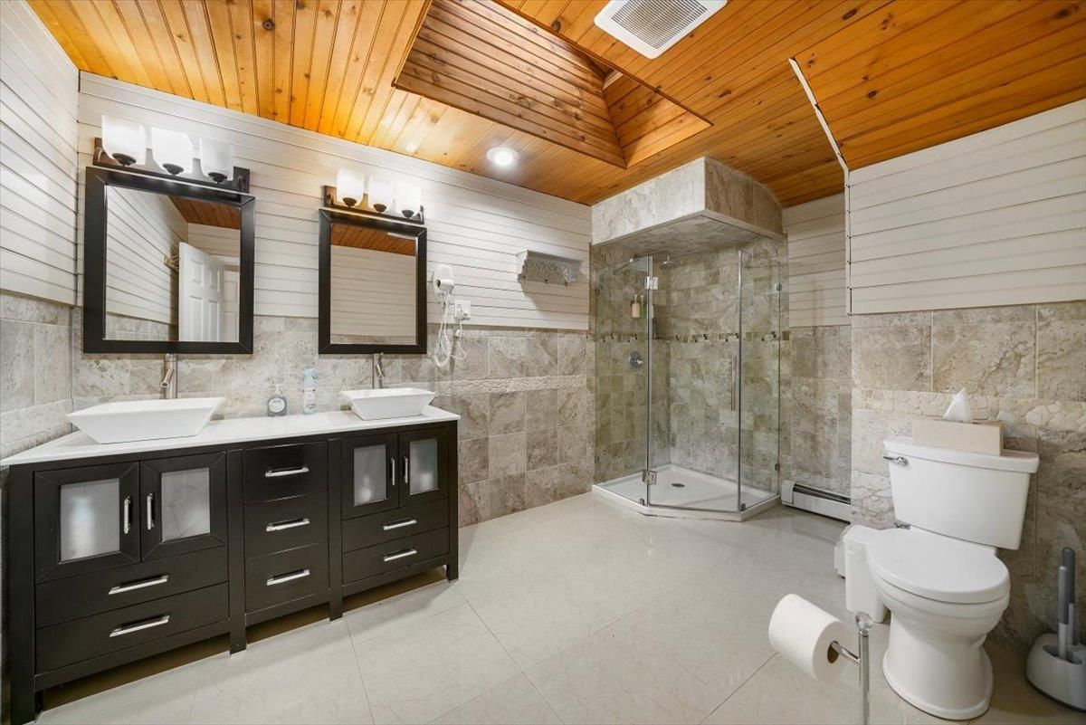Bathroom, Dual Sink Vanities, Glass Shower, Interior, Recessed Lighting, Wooden Ceilings