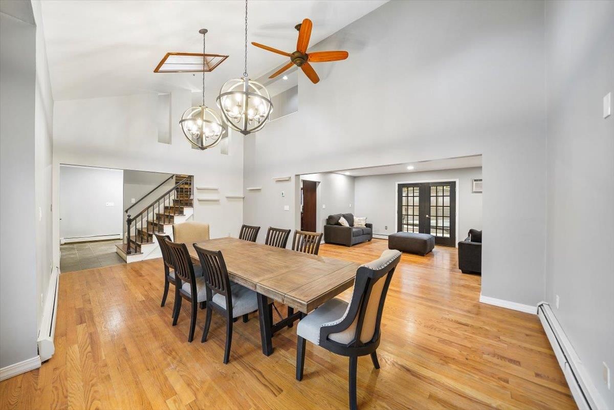 Chandelier, Dining room, Interior, Living room, Pendant Lights, Recessed Lighting, Wood Texture Flooring