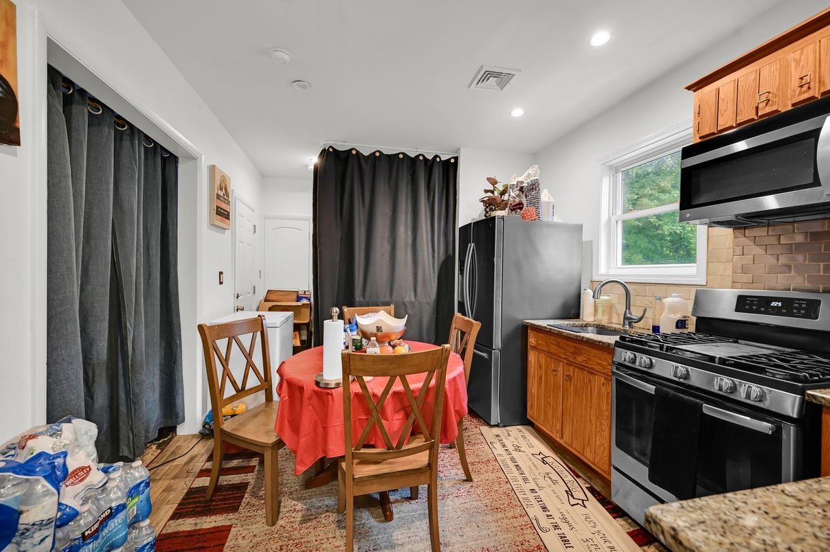 Dining room, Interior, Kitchen, Recessed Lighting, Stainless Steel Appliances, Wood Texture Flooring