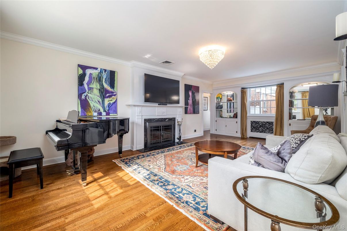 Chandelier, Fireplace, Interior, Living room, Piano, Wood Texture Flooring