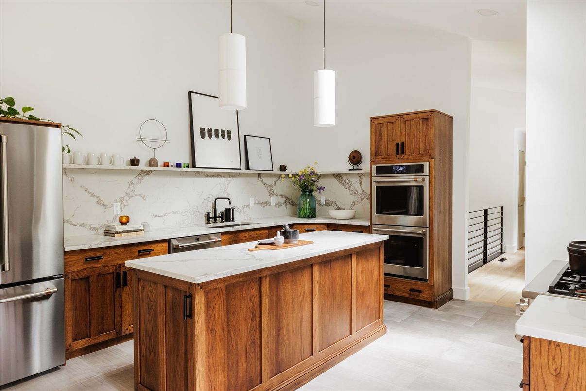 Interior, Kitchen, Marble Walls, Pendant Lights, Stainless Steel Appliances