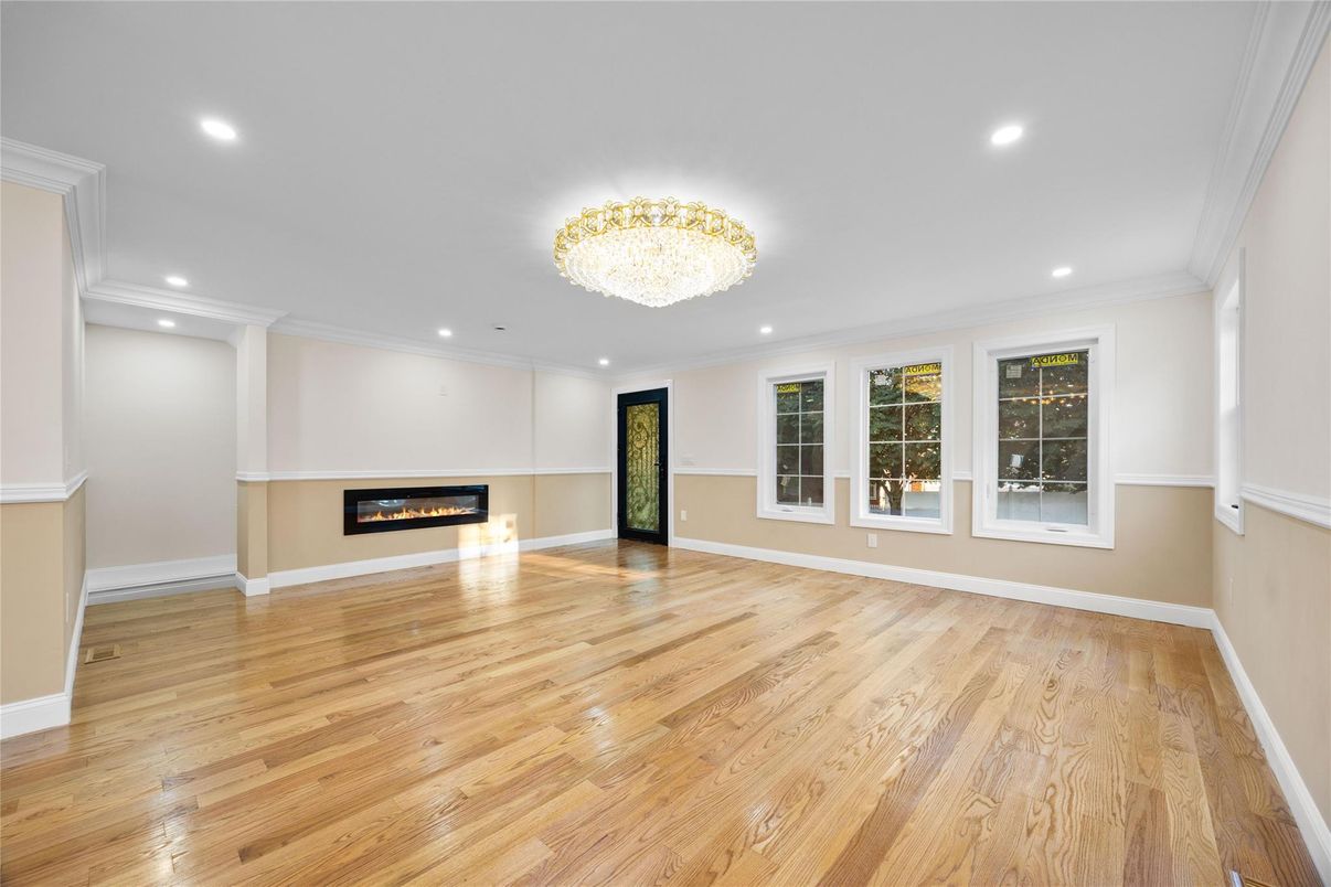 Chandelier, Empty room, Fireplace, Interior, Recessed Lighting, Wood Texture Flooring