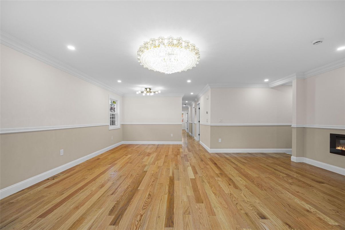 Chandelier, Empty room, Fireplace, Interior, Recessed Lighting, Wood Texture Flooring