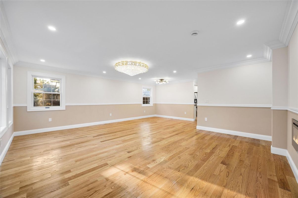Chandelier, Empty room, Fireplace, Interior, Recessed Lighting, Wood Texture Flooring