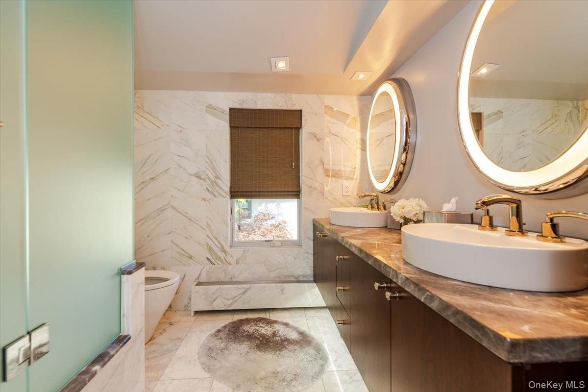 Bathroom, Dual Sink Vanities, Interior, Marble, Marble Walls, Recessed Lighting