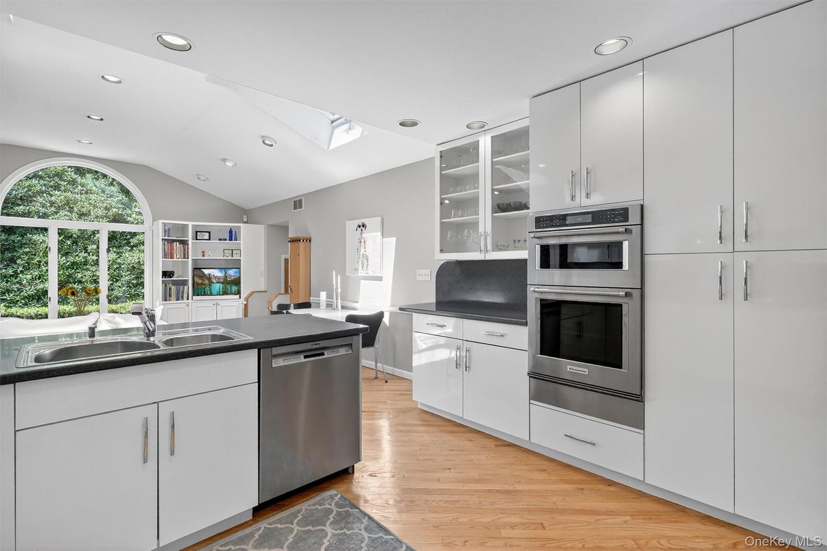 Dining room, Interior, Kitchen, Recessed Lighting, Stainless Steel Appliances, Wood Texture Flooring