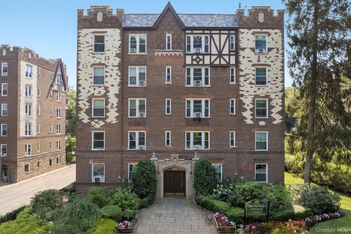 Exterior, Facade, Brick Facade, Condo Building
