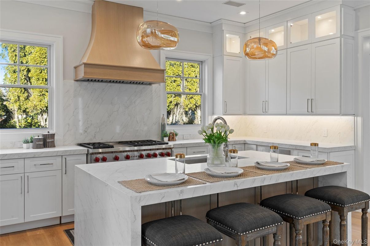 Interior, Kitchen, Marble Walls, Pendant Lights, Recessed Lighting, Stainless Steel Appliances, Wood Texture Flooring