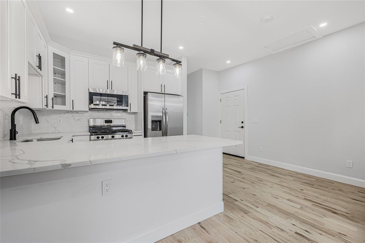 Interior, Kitchen, Pendant Lights, Recessed Lighting, Stainless Steel Appliances, Wood Texture Flooring