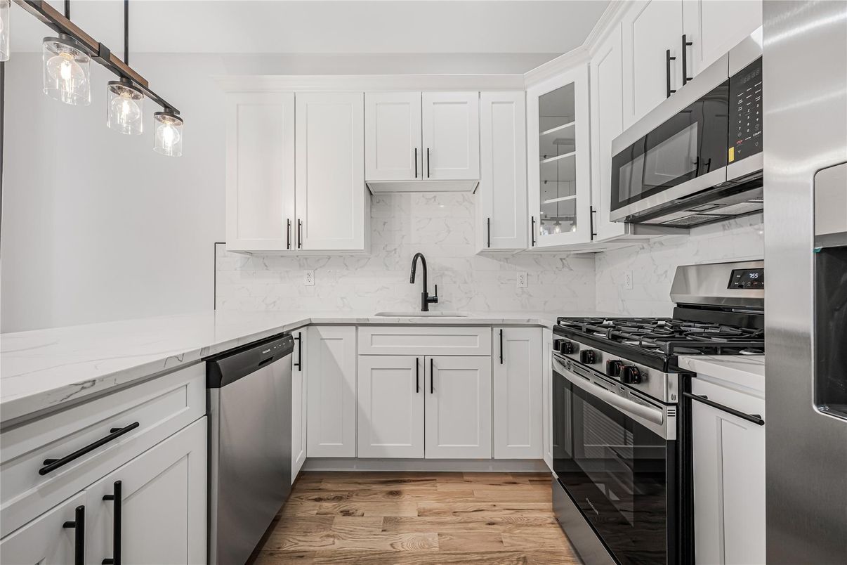 Interior, Kitchen, Marble Walls, Stainless Steel Appliances, Wood Texture Flooring